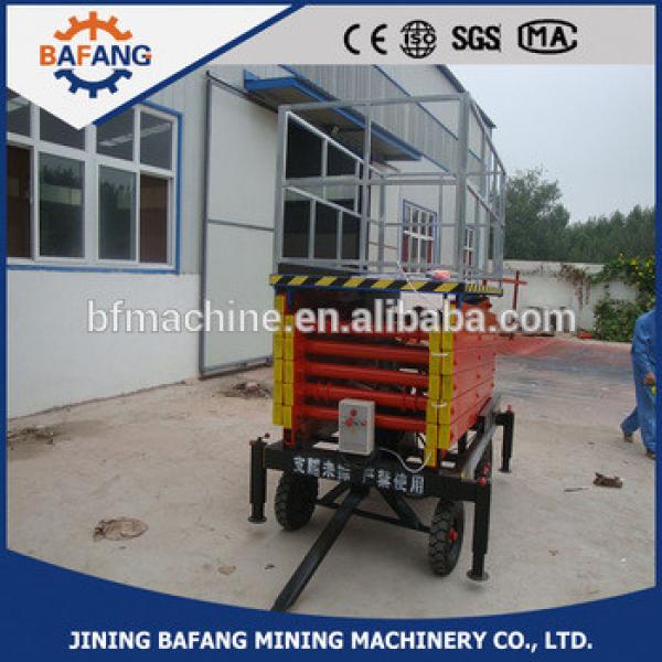 SJY0.3-8 four wheels mobile hydraulic scissor lifting platform #1 image