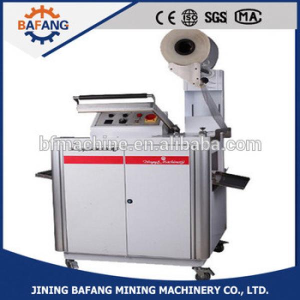 FM400 Automatic shrink wrapping machine for cosmetic box/book/mirror/chop board #1 image
